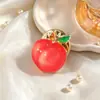 Nova Broche de Pêssego em Óleo Pintado Botão Anti-Luz Feminino Moda Simples Esmalte Pingando Pêssego Acessórios de Gola Agulha Feminino