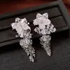 Aretes de Borla de Cuentas de Vidrio Flor de Aguja Plateada, Elegancia Francesa, Temperamento Único, Lujo Ligero, Pendientes de Gama Alta al por Mayor
