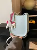 Bolsas Pequeñas de Verano de Moda Transfronterizas para Mujer 2026 Nueva Moda Versátil Bolso Cruzado tipo Cubo Super Popular Bolso para Teléfono