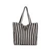 Bolso de mano a rayas de moda para otoño e invierno 2024, bolso de compras de doble color, bolso de hombro de gran capacidad y tendencia.