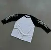 Conjunto de otoño ins de color block simple, camiseta unisex de manga larga con cuello redondo y estampado de letras, estilo nicho de corte holgado