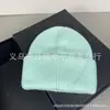 2026 Novo Chapéu de Tricô de Pelo de Coelho Estilo Coreano Fashionável Versátil Aconchegante Quente para Exterior Esqui Proteção de Orelha Branco com Lã