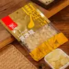 Azúcar de roca amarilla, azúcar de roca tradicional, jugo de crisantemo y pera, gránulos pequeños de níspero, azúcar de roca multicristalina auténtica hecha a mano, azúcar de roca de caña