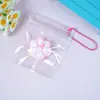 Libro Rojo Pequeño Nariz Pequeña Juguete para Apretar, Pollito de Rebote Lento, Patita de Gato Pulgar Colgante para Mochila, Juguete Popular para Aliviar el Estrés