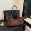 Bolso de Hombro de Gamuza Plegado con Cordón Estilo Coreano de Nicho para Mujer Otoño/Invierno 2026 Nuevo Casual Ligero