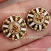 Botones al por mayor botones metálicos botones estilo Chanel huecos Perla resina epoxi cuentas accesorios para ropa Ojo de gato