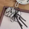 Pinza de plátano de malla de lunares retro estilo coreano con lazo de cinta largo y suelto Pinza vertical Parte posterior de la cabeza Peinado semi-recogido Accesorio para el cabello suave