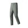 Pantalones impermeables personalizados para exteriores para hombre, pantalones deportivos cortavientos, pantalones de senderismo elásticos de nailon, pantalones casuales rectos holgados