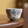 Taza de té flor de glicina pintada a mano taza individual color bajo vidriado ceniza vegetal cerámica para el hogar juego de té kung fu taza de degustación de té taza de maestro femenina