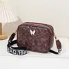 Bolso de mano para mujer con patrón de diamantes y decoración de mariposas estilo coreano, bolso de cámara moderno con correa ancha, bolso cruzado para el día a día del commuter, al por mayor