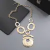 Set de collar y aretes geométricos de metal retro europeo y americano, cadena para suéter de círculo hueco, joyería de lujo ligero de moda al por mayor