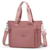 Bolsa tote de nylon de grande capacidade para mulheres, novo estilo 2026, bolsa de ombro leve e à prova d'água em tecido Oxford, adequada para o dia a dia, pode ser carregada na mão ou usada na transversal