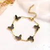 Popular Set de Pendientes Doble Cara de Mariposa con Acabado Dorado, Diseño de Nicho, Acero de Titanio Nácar, Collar y Pulsera de Alta Gama Transfronteriza 18K