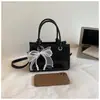 Bolsa Quadrada Pequena de Mão Cor Sólida 2026 Verão Nova Moda Estilo Coreano Alto Valor Elegante Bolsa de Ombro Único Transversal