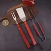 Traje combinado de herramientas para hornear de tres piezas Producto de Amazon acero inoxidable mango de madera tenedor pala pinza herramienta para barbacoa suministro directo
