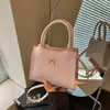 Bolsa de Mão de Couro Oleado com Laço para Comércio Exterior Feminina 2026 Nova Moda Versátil Ombro Transversal Bolsa Quadrada Pequena Tendência