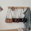 Bolso Femenino para Axila 2026 Nuevo de Moda Primavera/Verano Texturizado de Moda Bolso de Hombro para Viaje Diario Bolso Cruzado tipo Cubo