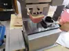 Máquina de tampografia manual, máquina de tampografia altamente automatizada, máquina de tampografia para copo de óleo de maçã de Natal, máquina de impressão de alta velocidade