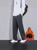 Marca da moda outono/inverno 2026, calça de moletom esportiva lisa e simples com forro de fleece para homens, estilo de rua retrô, corte solto, calça casual versátil