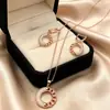 Conjunto de pendientes y collar Xuping estilo vintage de nicho europeo y americano transfronterizo, conjunto de joyería elegante de aleación de cobre, venta al por mayor y hecho a medida