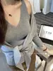 Conjunto de Cárdigan de Punto Irregular con Lazo Estilo Coreano Otoño + Camisola Ajustada de Cuello en V para Mujer 395