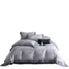 Nuevo juego de ropa de cama de cuatro piezas de algodón de fibra larga cepillado, con 60 hilos, que ofrece una sensación lujosa y de alta gama, disponible en estilos de sábana plana, sábana ajustable y colcha de algodón puro