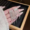 Brincos de Moda Super Fada Exquisite Laço Leve Luxo High-end Elegante Versátil Clipe de Orelha Brincos Longos com Franja para Mulheres
