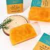 Jabón SimitisGold con Polvo de Oro Jabón Limpiador Trapezoidal Hecho a Mano Jabón de Aceite Esencial Perfumado 80g Fabricante Venta al por Mayor y Dropshipping