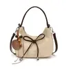 Bolso transfronterizo, diseño minimalista y único, bolso de hombro con lazo, versátil para el trabajo, bolso cruzado y un bolso de mano elegante