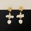 Pendientes colgantes de perlas barrocas transfronterizas de Europa y Estados Unidos, pendientes de moda nicho con temperamento chapado en oro y cobre para mujer