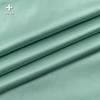 Tencel satén mate satén tela de chaqueta acolchada de plumón poliéster antisalpicaduras anti-terciopelo otoño e invierno chaqueta acolchada de algodón chaleco tela venta al por mayor