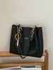 Bolso de mano grande cruzado estilo coreano vintage casual para el trabajo y los desplazamientos, nuevo bolso de hombro tipo tote tejido 2026