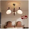 Lámpara de araña antigua francesa para sala de estar, estilo retro de nogal, 2024, nueva lámpara de diseño de iluminación de alto sentido para dormitorio principal.