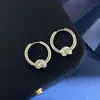 Estilo Coreano Versátil Simple Estilo Oficina Diseño de Cuerda Anudada Aros Lisos Circulares con Micro-Incrustaciones de Diamante