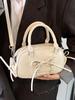 2025 Nuevo Bolso Boston Portátil de Estilo Ballet Simple con Cordones Nicho Casual Nicho Versátil Estilo Occidental Bolso Cruzado