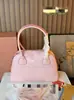 2026 Nueva Familia Miu Bestseller Bolso Tipo Bowling de Cuero Curtido Vegetal Bolso de Mano Estilo Perezoso Casual Bolso de Hombro