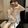 Pijama Xadrez Jacquard de Seda Imitação Estilo Celebridade da Internet para Mulheres Conjunto de Duas Peças de Seda Gelada com Mangas Longas para Casa Primavera e Verão 2026 para Mulheres
