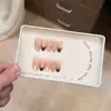 Uñas francesas de leopardo nude color hielo de verano, iluminadoras y sofisticadas, uñas portátiles hechas a mano, estilo mediano-largo, deslumbrantes con pedrería