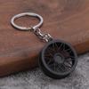 Accesorios de modificación de automóviles transfronterizos directos de fábrica, pequeños regalos, colgante de rueda de metal para hombres, llavero de rueda al por mayor