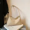 Bolsa Casual Retro de Camurça Feminina 2025 Outono e Inverno Nova Bolsa de Ombro para o Trabalho Bolsa de Braço Coreana de Nicho