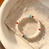Novo design de pulseira vintage nicho estilo chinês com pedra olho de gato, simples e moderno, versátil para meninas e melhores amigas