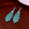 Brincos de Ródio com Strass em Formato de Losango Estilo Zhao Lusi, Brincos com Franjas de Luxo Acessível e Design de Alta Qualidade, Brincos Modernos e Versáteis