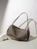 Bolso de almuerzo para el trabajo de nuevo estilo, bolso de hombro para llevar debajo del brazo, piel de vaca de capa superior, bolso de mano de cuero genuino de alta gama de nicho de moda