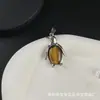 Venta Caliente Transfronteriza de Amazon Cristal Rosa Natural Ojo de Tigre Forma de Huevo de Pingüino Colgante Collar Estilo Coreano Joyería