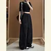 Calça casual larga estampada em preto e cinza com efeito desgastado, novo design para primavera e verão feminino, calça versátil solta estilo americano