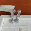 Pendientes con forma de mariposa, circonita y perla con forma de placa de incienso de mosquitos para mujer, nuevos y únicos, elegantes y largos, de alta gama.