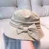 Chapéu de Pescador Elegante com Laço Moda Feminino Primavera e Verão Estilo Coreano Viagem de Férias Proteção Solar Chapéu de Sol Casual Versátil Chapéu Balde