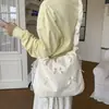 Bolsa de ombro doce e fofa em formato de laço amarelo leitoso, com design de alça de ombro franzida, uma bolsa transversal fofa para meninas