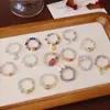 Anillo de Cristal Natural Elástico Moda Nacional Nuevo Diseño Chino Cuerda Elástica con Cuentas Anillo de Cristal Anillo de Temperamento Venta al por Mayor