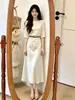 Los atuendos para mujeres petite lucen geniales: Conjunto de Top y Falda para Mujer, Nuevo Estilo Verano 2026, Impresionante y Elegante Conjunto de Dos Piezas